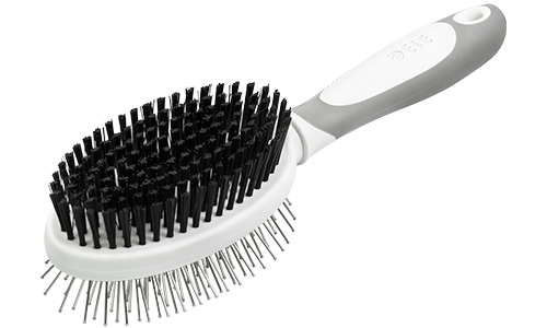 Dvoustranný psí kartáč s ergonomickou rukojetí, s měkkými štětinami na jedné straně a kovovými hroty na druhé pro dvojí péči.